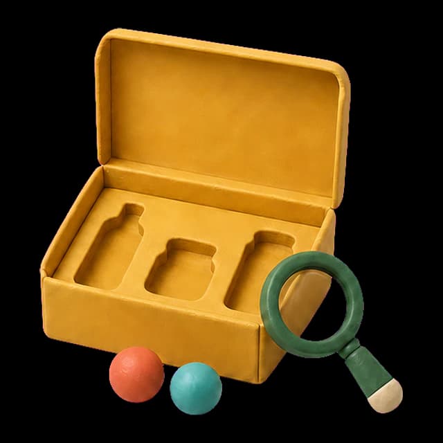 Clay sample box and magnifying glass
